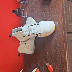 Sneakers by the rock under armour